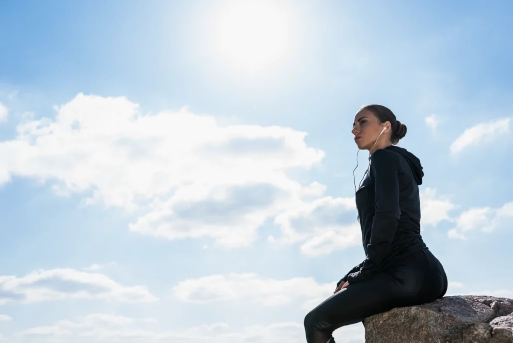 Sporty woman enjoying outdoor activity, embracing nutritional therapy for migraine relief