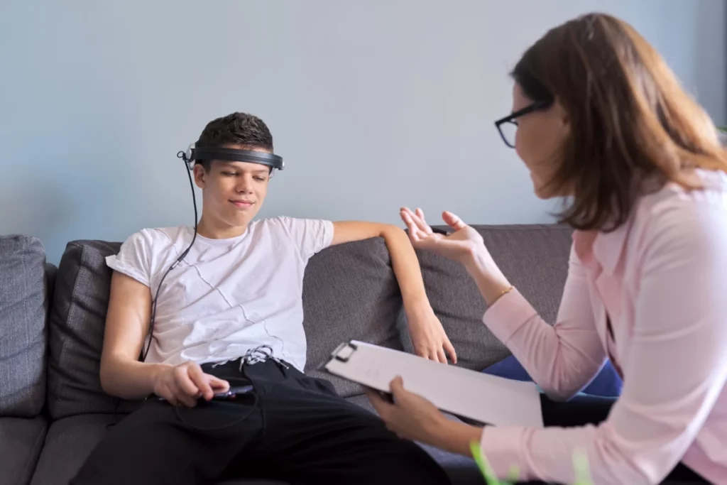 Child undergoing neurofeedback therapy for ADHD management